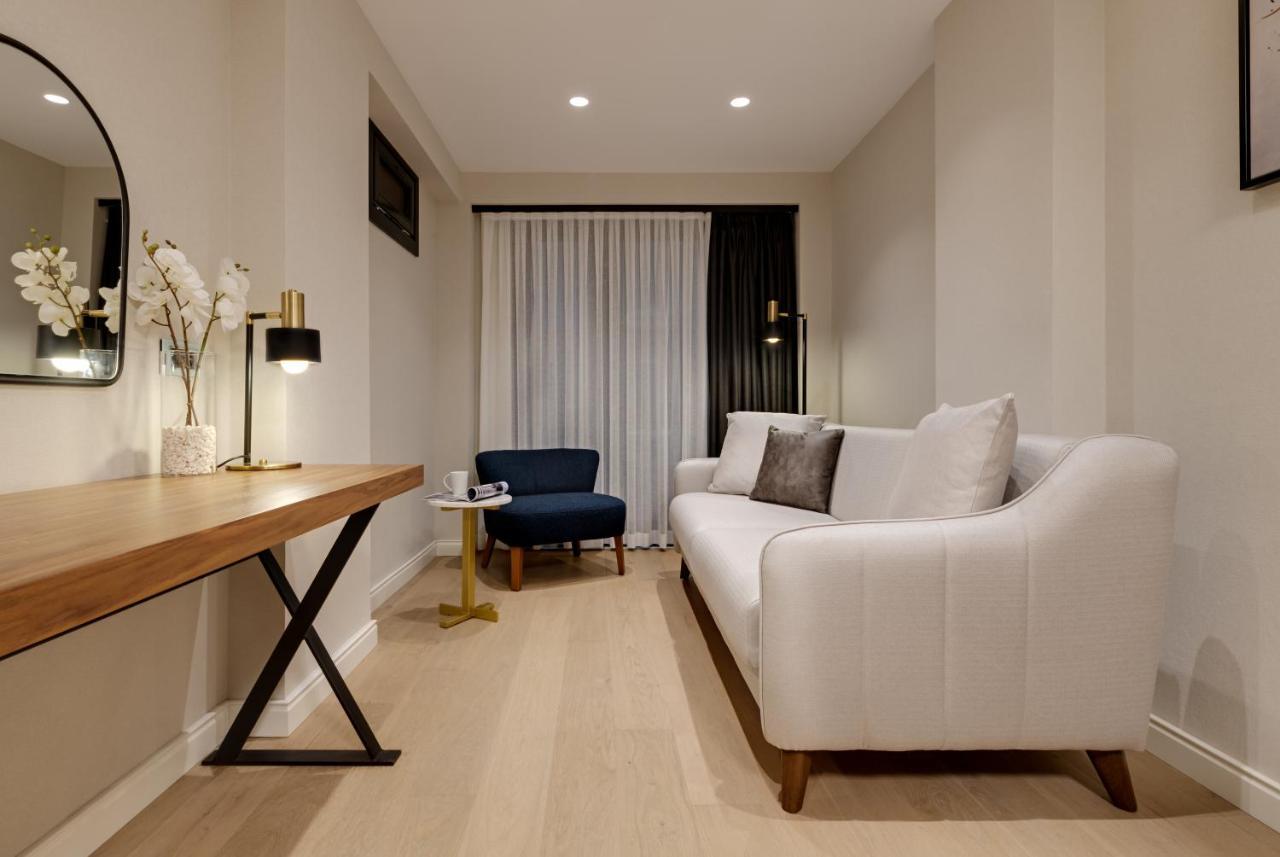 Gleam Collection Hotel Estambul Exterior foto A living room in a micro apartment